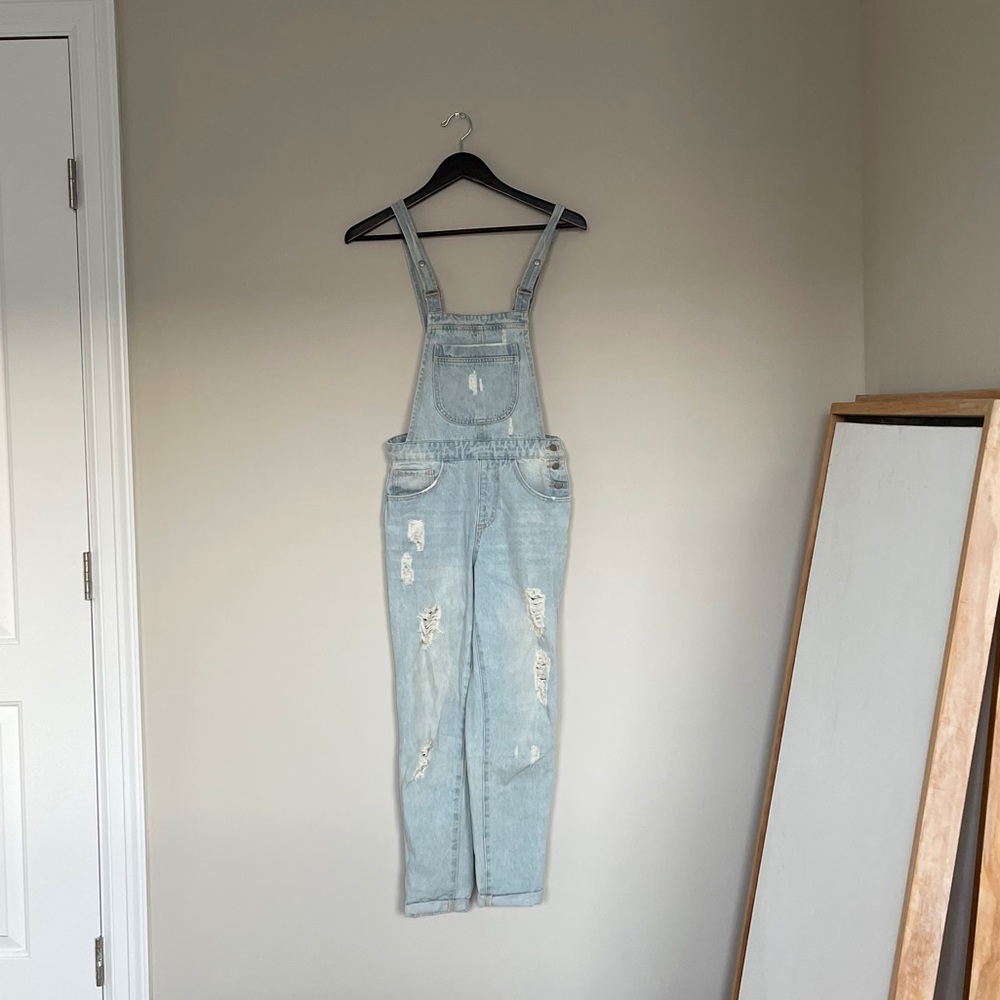 Distressed light blue overalls